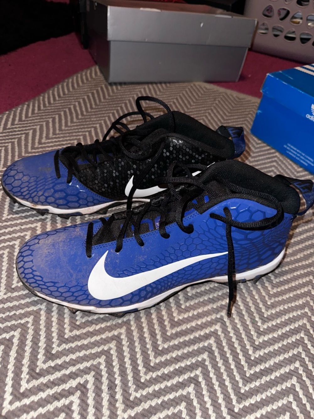 Nike Blue and Black Men’s Baseball Cleats with White Swoosh
